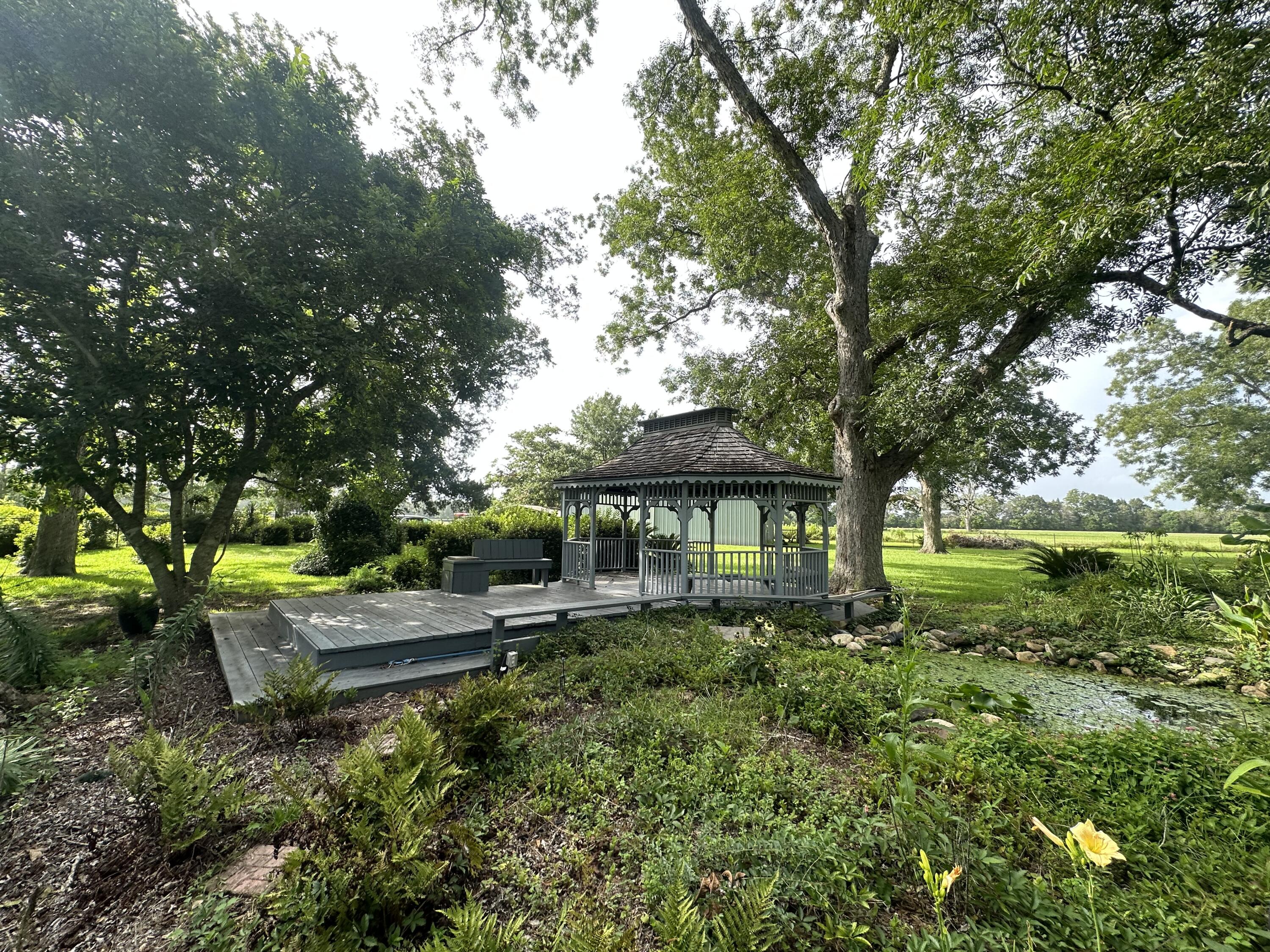 5303 Griffith Mill Road Baker, FL 32531 - Photo 2 of 58 a front view of a house with a yard