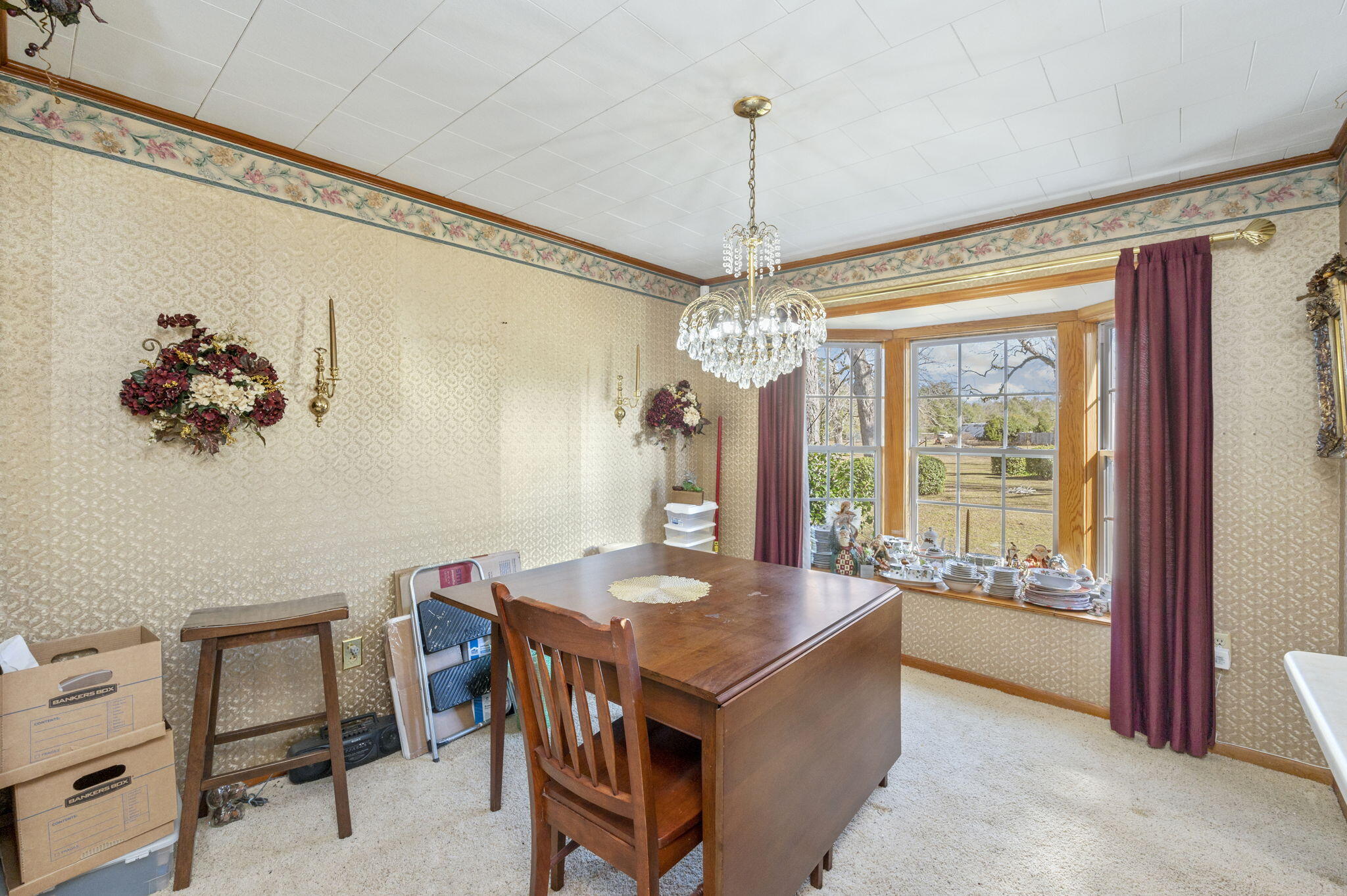 5303 Griffith Mill Road Baker, FL 32531 - Photo 29 of 58 a view of a dining room with furniture window and outside view