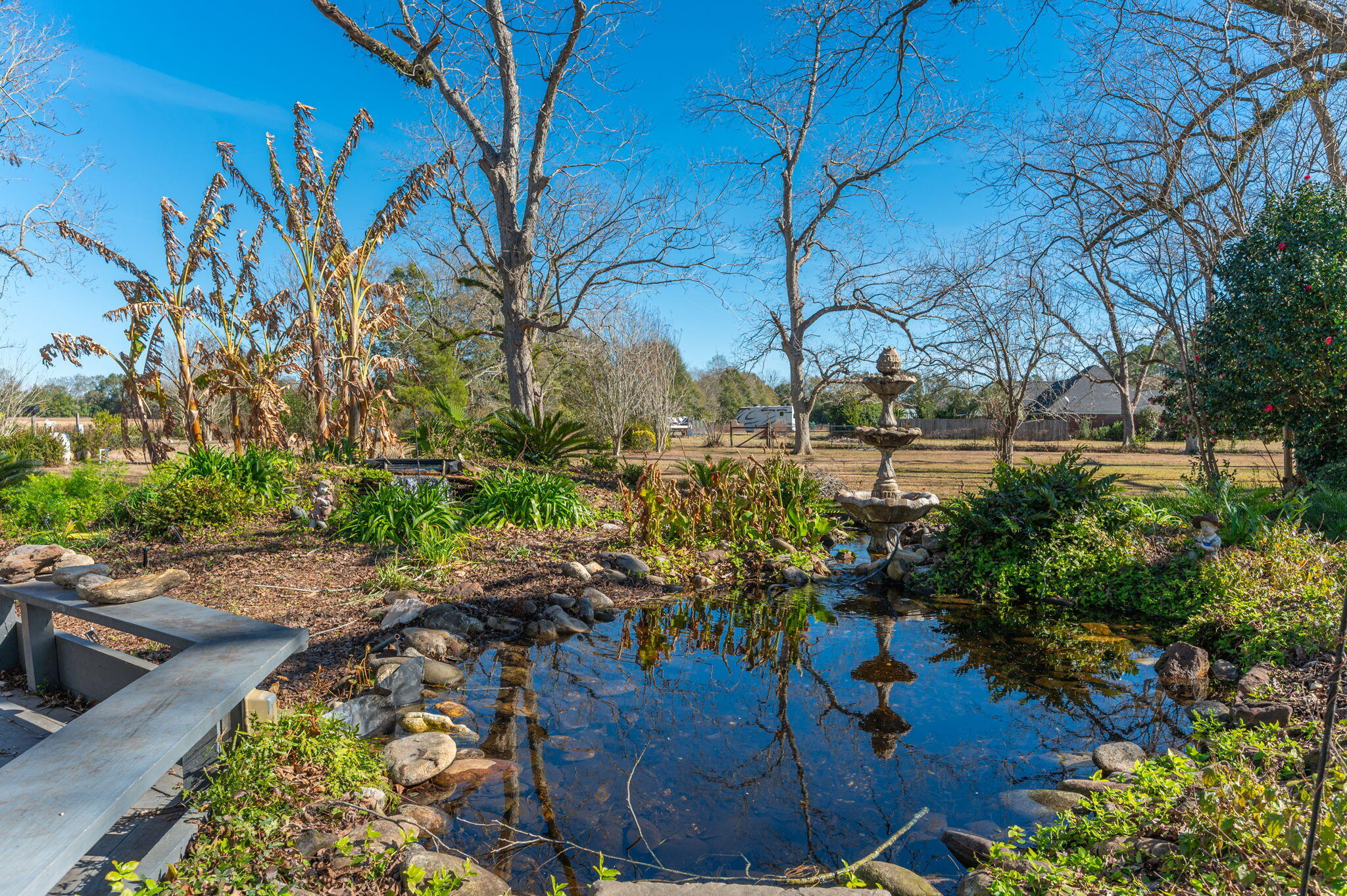5303 Griffith Mill Road Baker, FL 32531 - Photo 43 of 58 a view of a backyard of the house