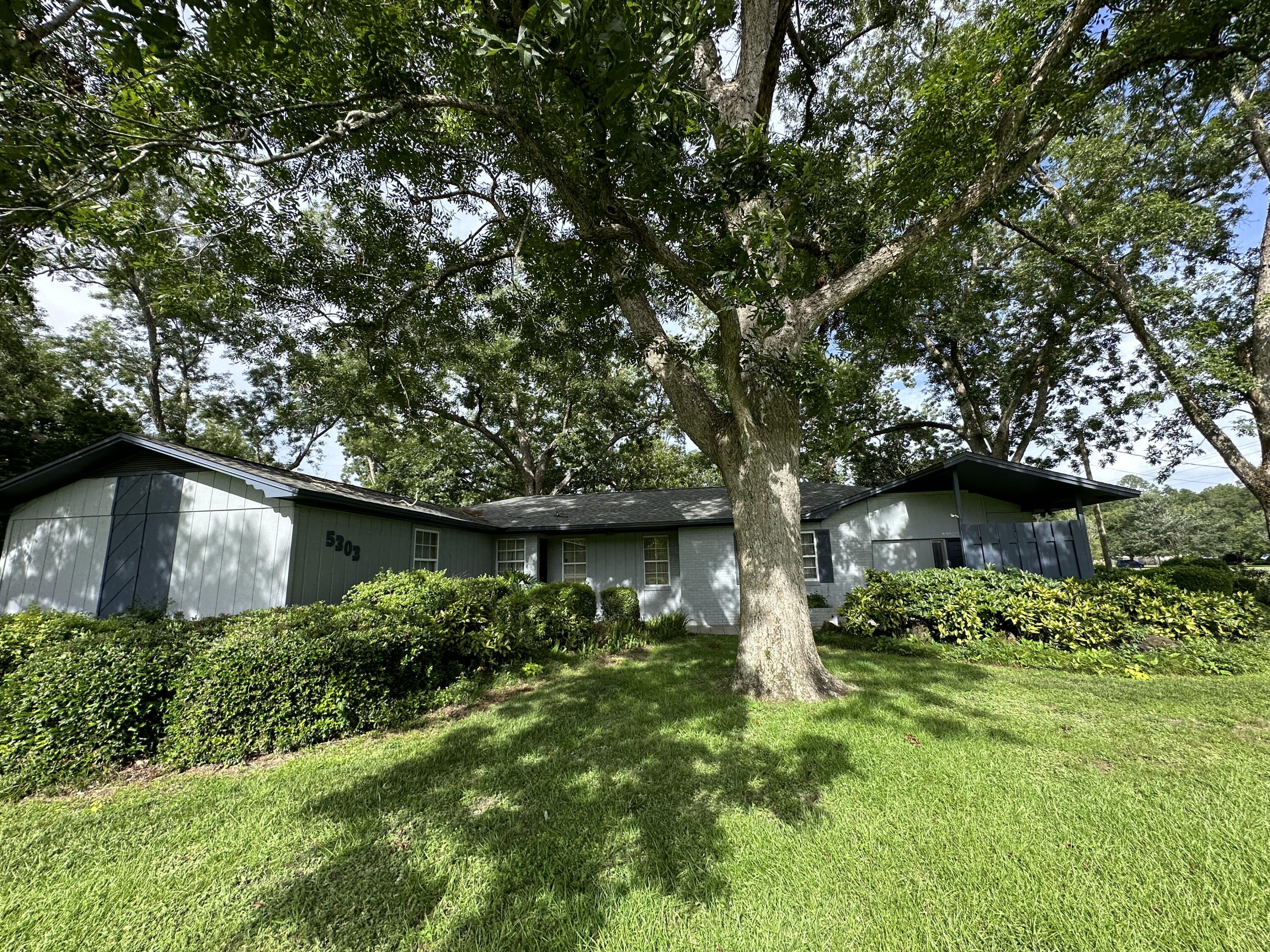 5303 Griffith Mill Road Baker, FL 32531 - Photo 57 of 58 a backyard of a house with lots of green space