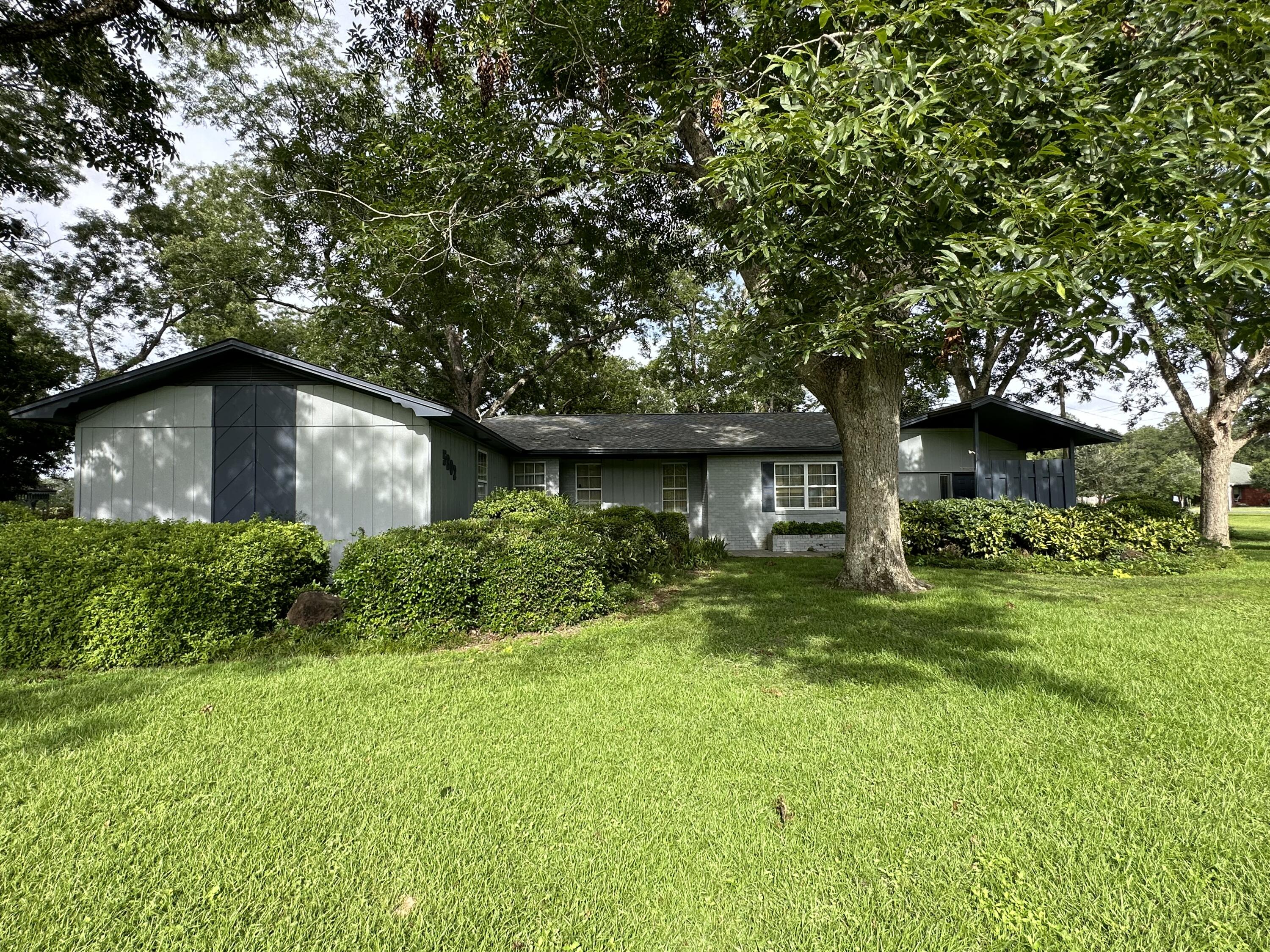 5303 Griffith Mill Road Baker, FL 32531 - Photo 58 of 58 a view of a house with a yard