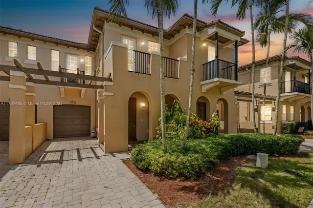 a view of a building with a garden