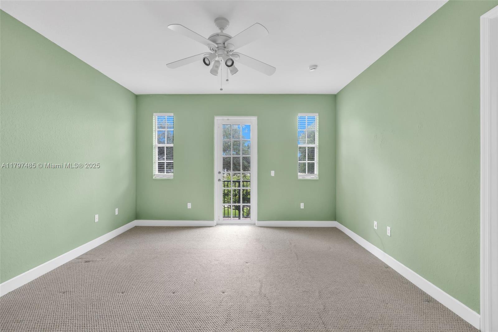 8706 Blaze Court Davie, FL 33328 - Photo 17 of 44 an empty room with a empty space and windows