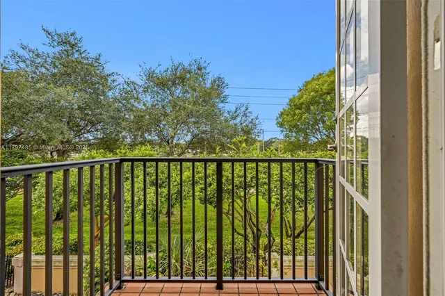 a balcony with a yard