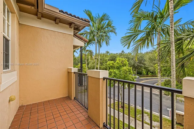 a view of a street from a corridor