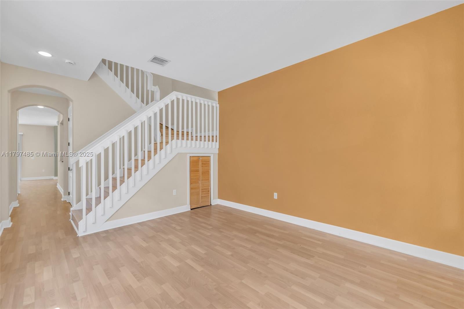 8706 Blaze Court Davie, FL 33328 - Photo 3 of 44 a view of entryway with wooden floor
