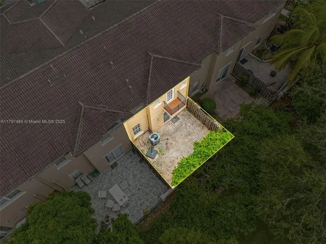 a patio with table and chairs