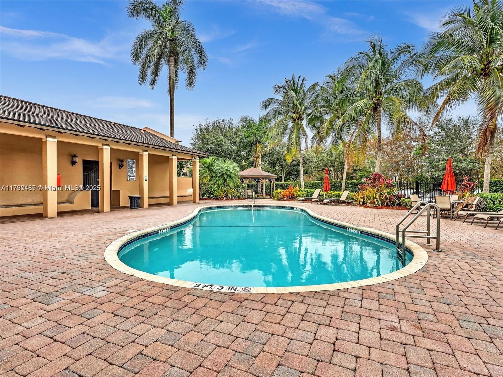 8706 Blaze Court Davie, FL 33328 - Photo 41 of 44 a view of outdoor space with swimming pool