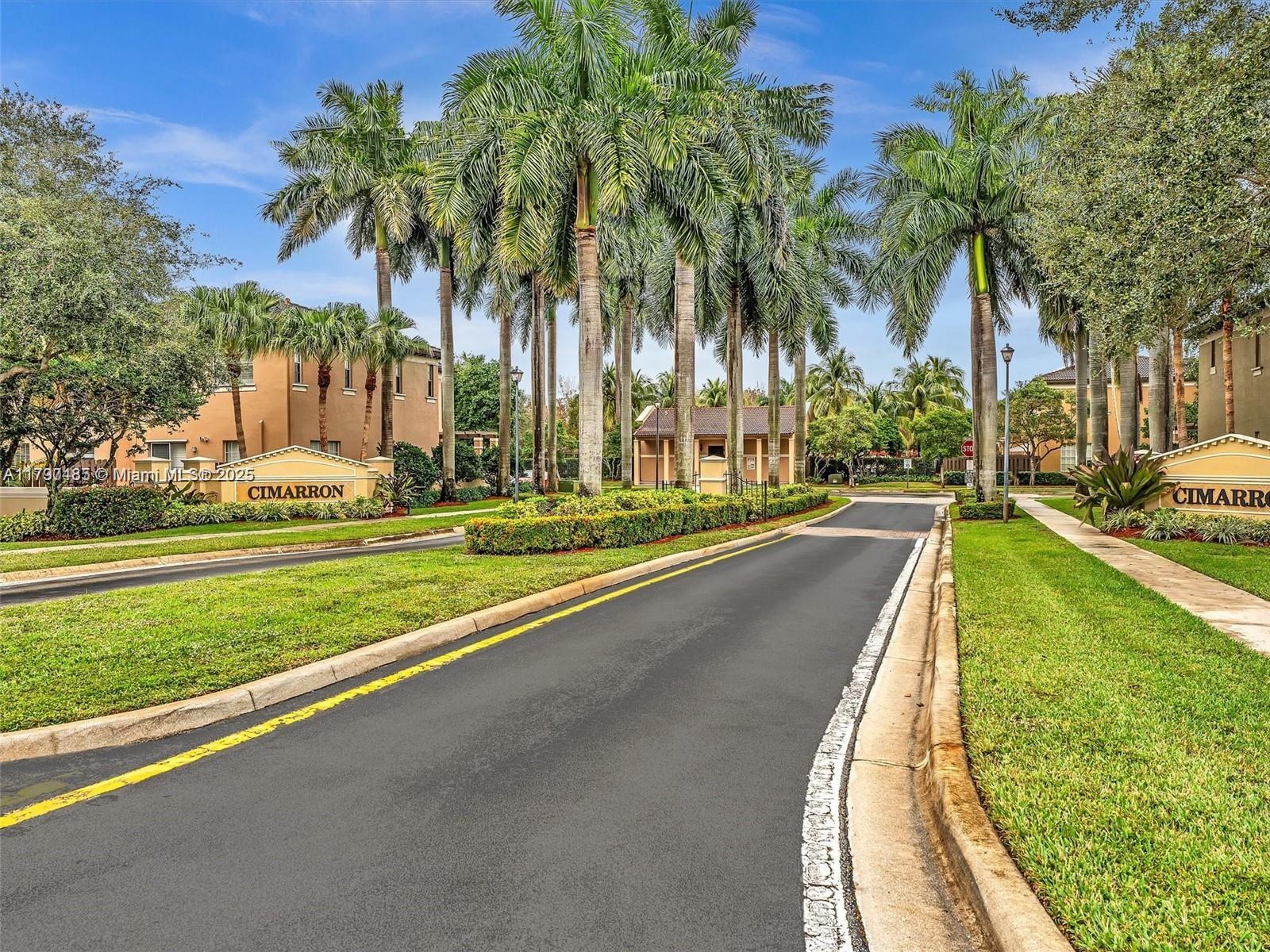 8706 Blaze Court Davie, FL 33328 - Photo 42 of 44 a view of a yard with palm trees