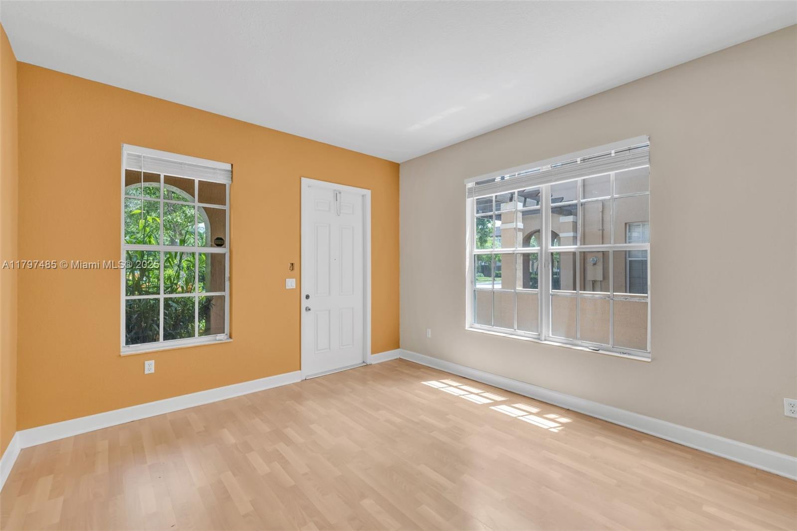 8706 Blaze Court Davie, FL 33328 - Photo 5 of 44 a view of an empty room with a window
