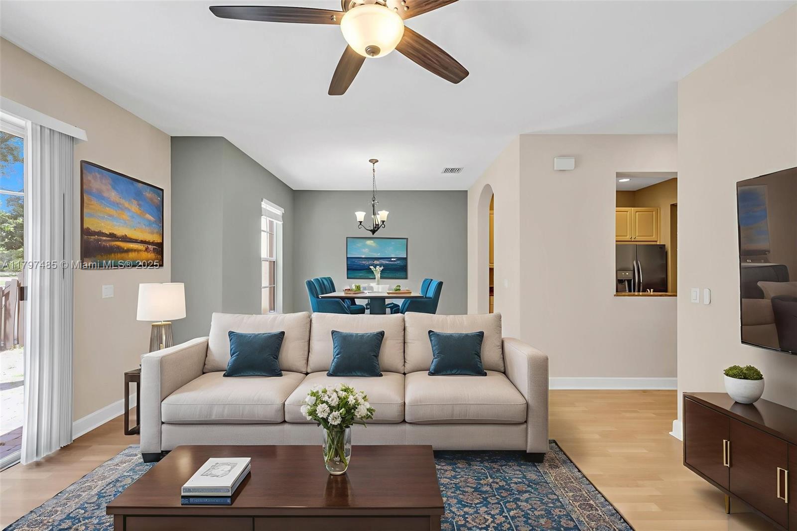 8706 Blaze Court Davie, FL 33328 - Photo 10 of 44 a living room with furniture and a couch