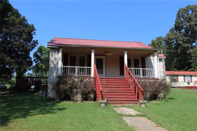 Farmhouse style home on 10 acres+/-, pond on the property & Stewart State Forest at your side! 