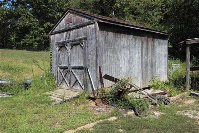4670 Highway 49 Tennessee Ridge, TN 37178 - Photo 10 of 20 Perfect lawnmower equipment shed.