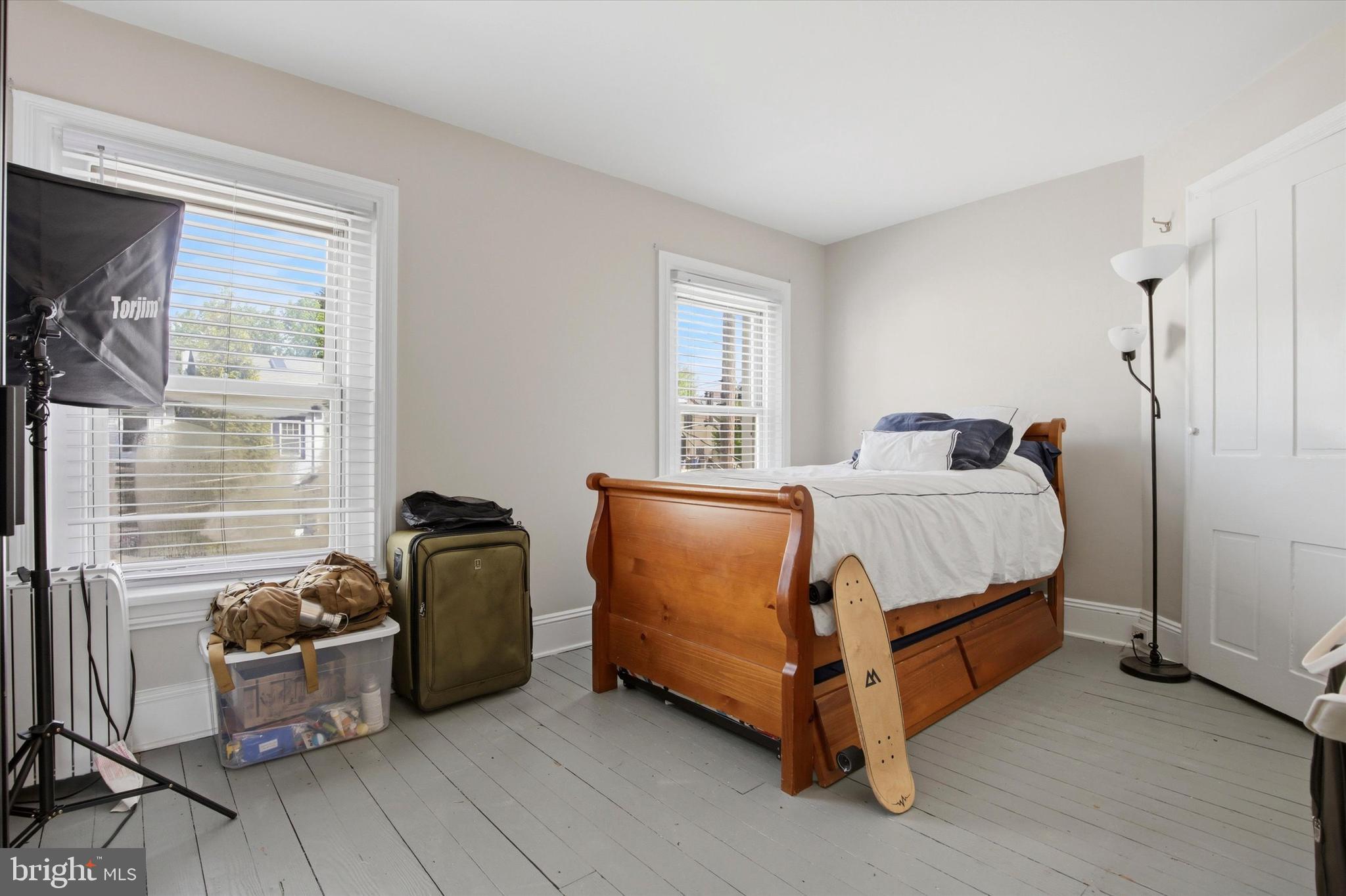 343 Spring Mill Avenue Conshohocken, PA 19428 - Photo 16 of 24 a bedroom with a bed and a window