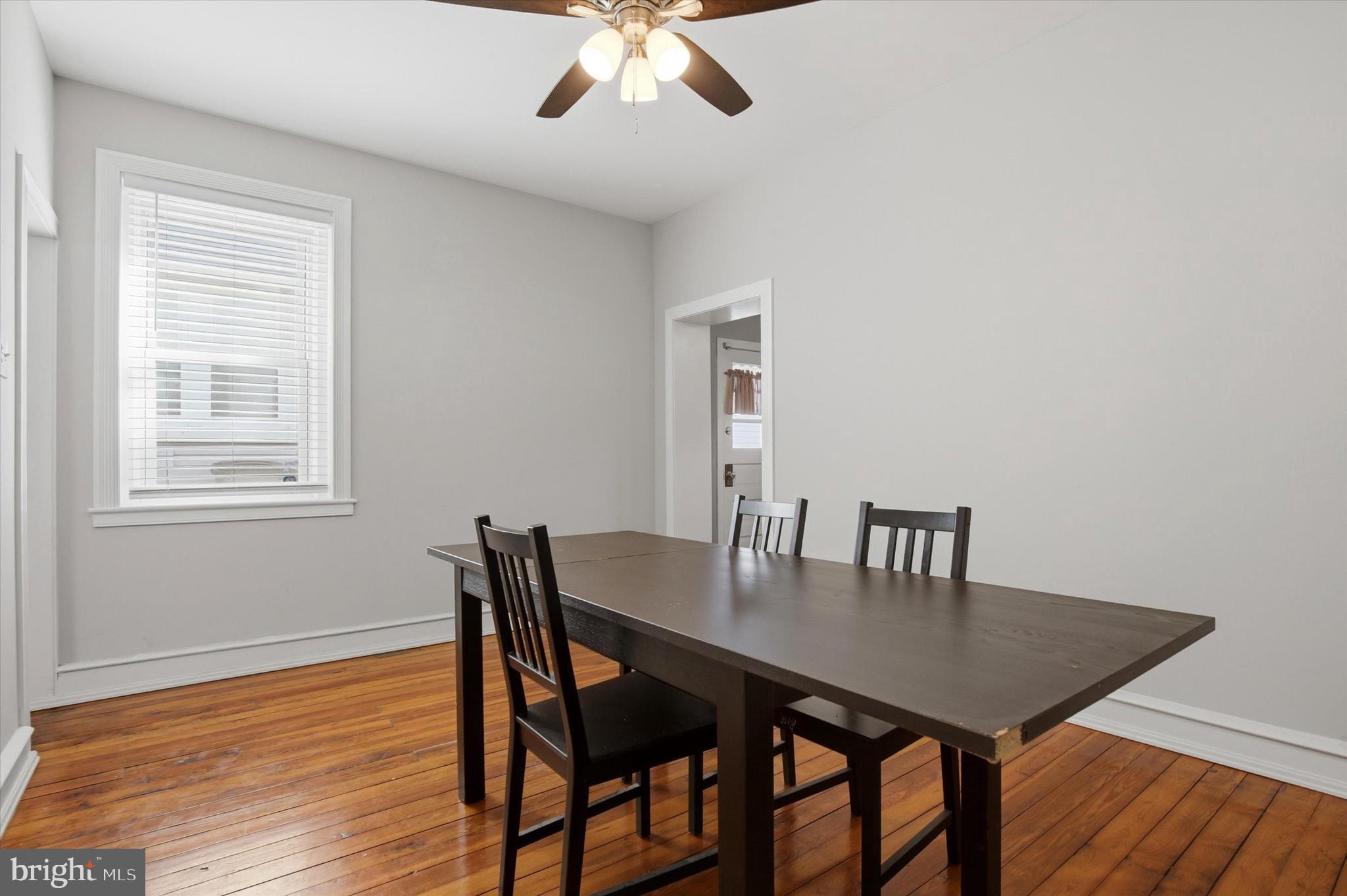 343 Spring Mill Avenue Conshohocken, PA 19428 - Photo 7 of 24 a view of a dining room with furniture and wooden floor