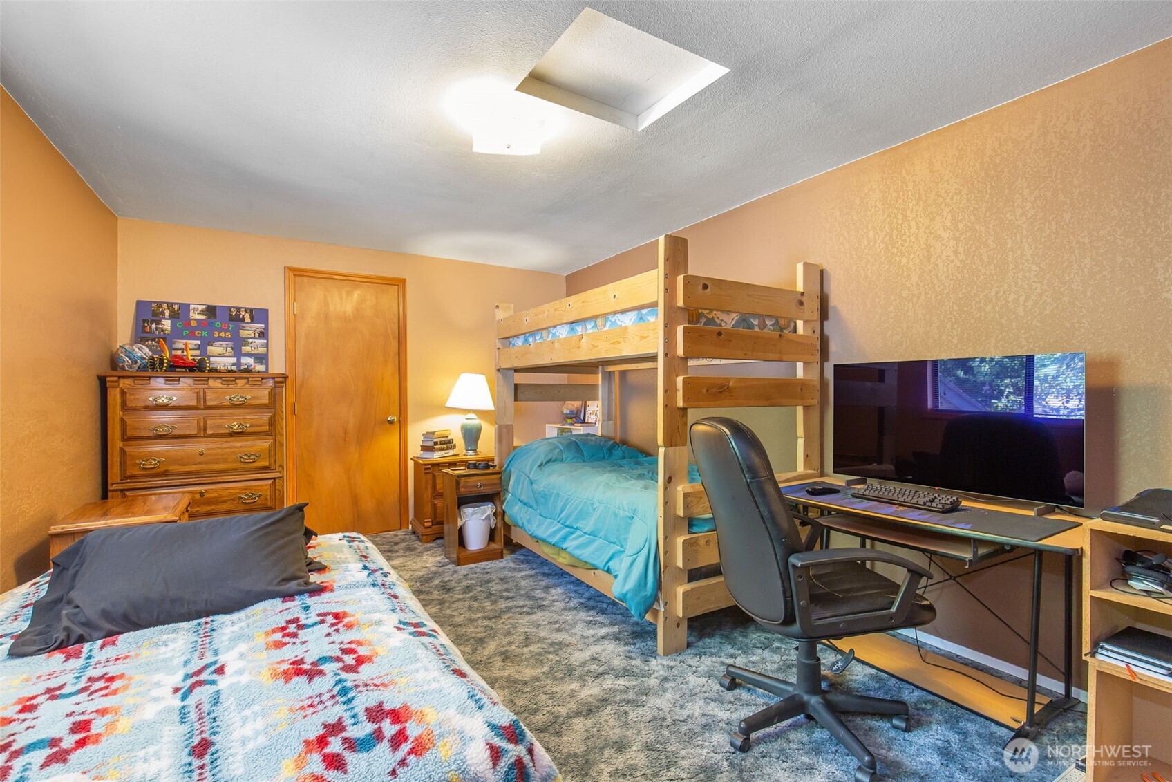 1497 Old Military Road Southeast Tenino, WA 98589 - Photo 16 of 34 a bedroom with a bed and a desk