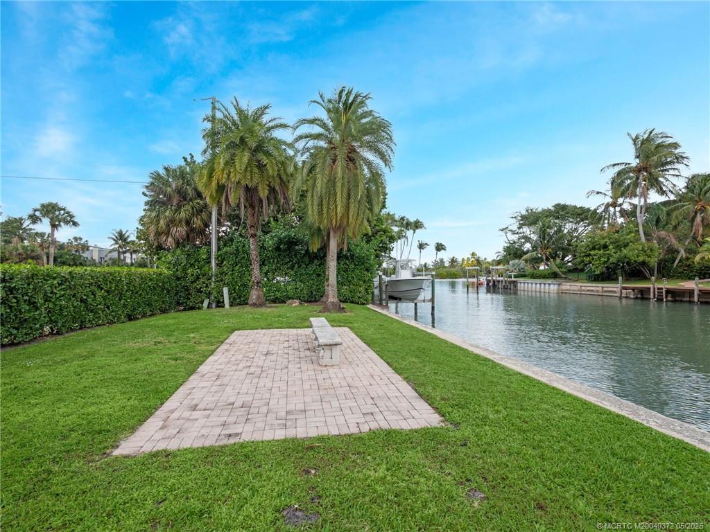 6 West High Point Road Stuart, FL 34996 - Photo 48 of 54 a view of a lake with a yard
