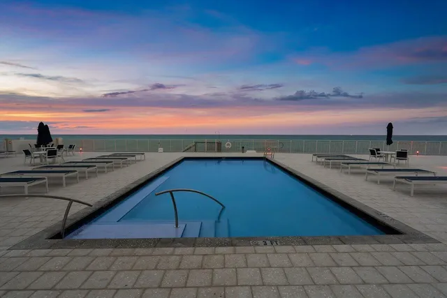 a view of outdoor space with swimming pool