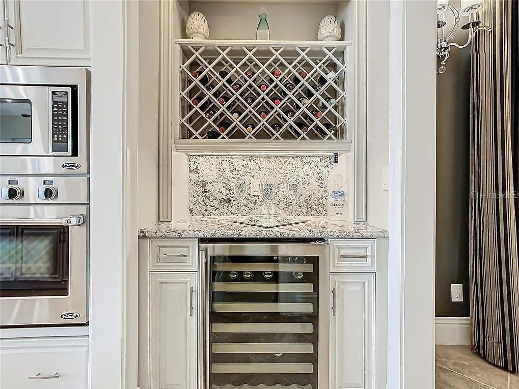395 Muirfield Loop Reunion, FL 34747 - Photo 13 of 50 a view of a storage and utility room