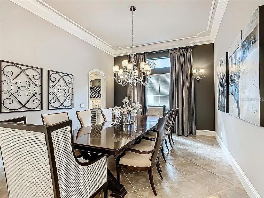 395 Muirfield Loop Reunion, FL 34747 - Photo 7 of 50 a dining room with furniture and window