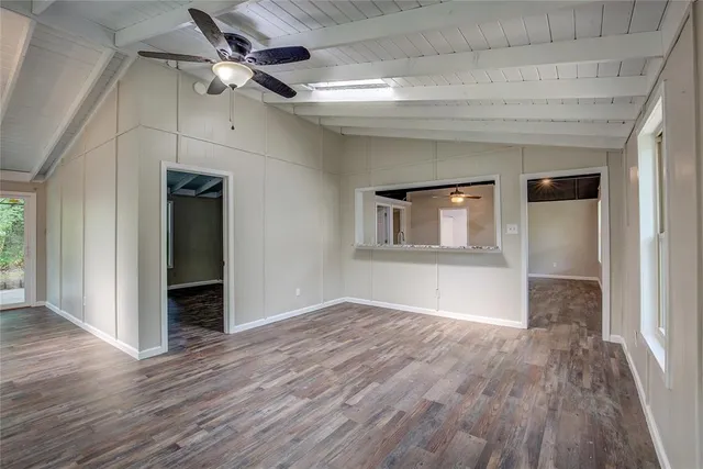 a kitchen with stainless steel appliances granite countertop a stove and a refrigerator