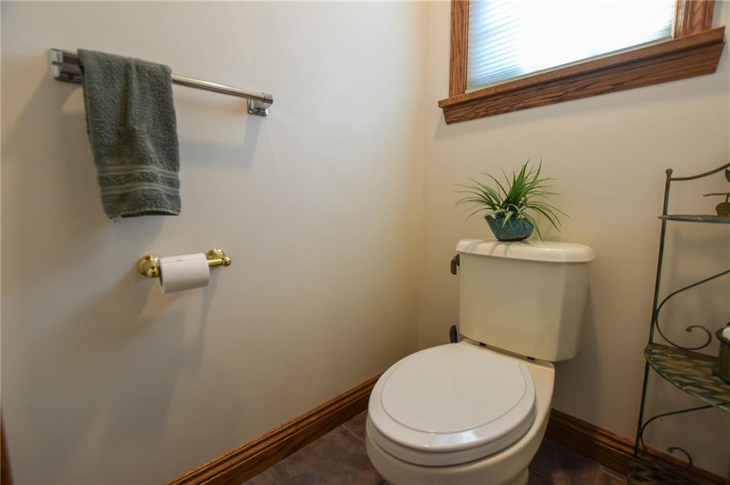 115 Shepperd Drive Butler, PA 16002 - Photo 16 of 24 a white toilet sitting next to a small window