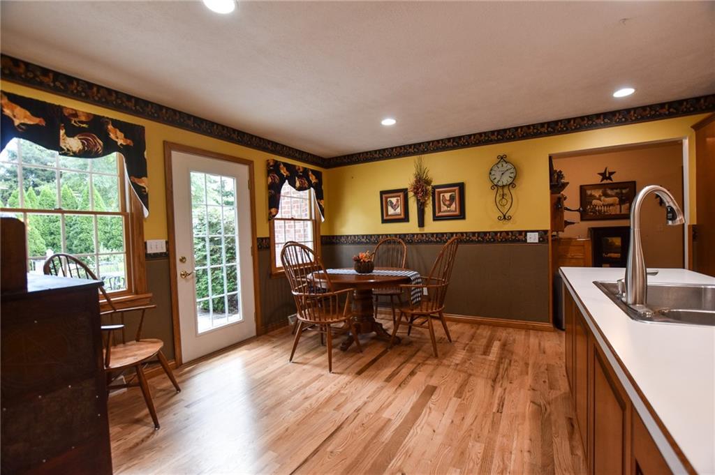 115 Shepperd Drive Butler, PA 16002 - Photo 6 of 24 a living room with furniture and a flat screen tv