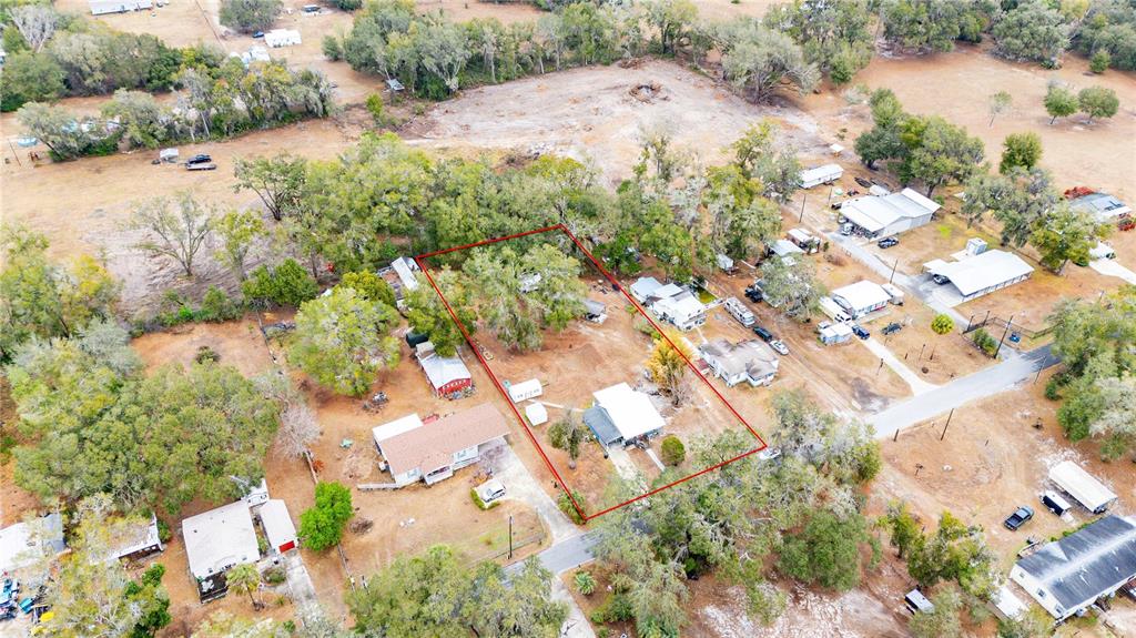 110 County Road 534 Bushnell, FL 33513 - Photo 27 of 60 an aerial view of a houses with yard
