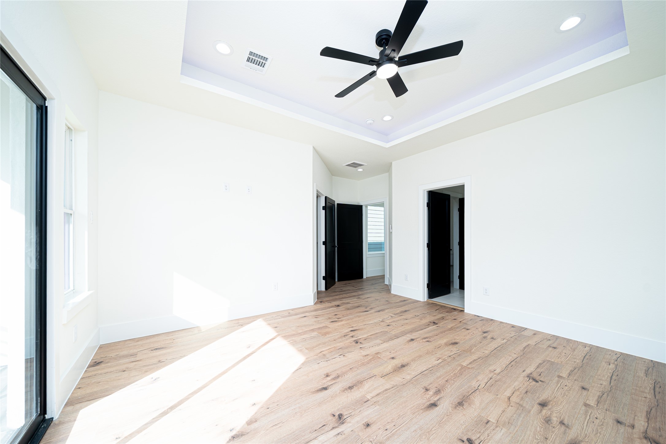 2503 Parker Road Houston, TX 77093 - Photo 7 of 17 a view of a hallway with a ceiling fan