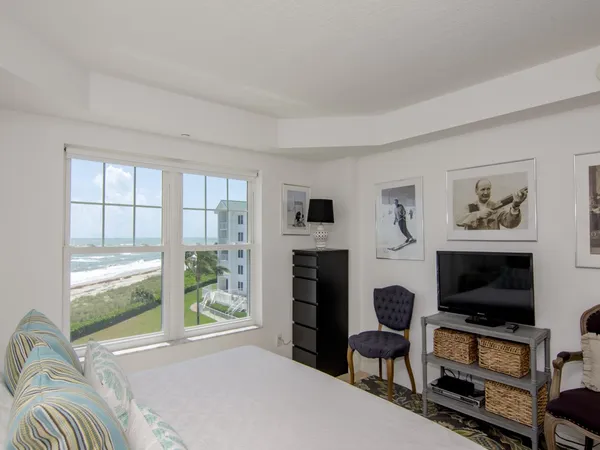 a bathroom with a sink double vanity granite tub and shower