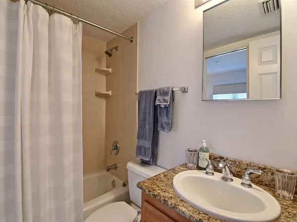 a room with a table and chairs