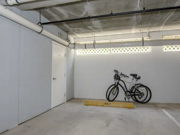 a view of a swimming pool and an outdoor seating