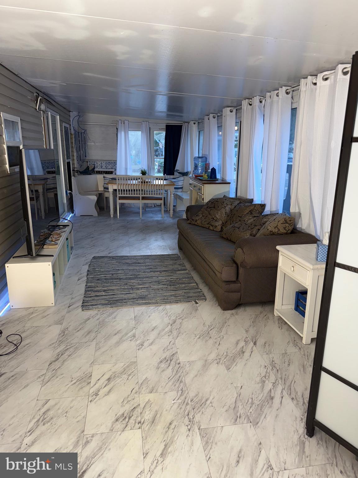 515 Corsons Tavern Road, Unit H61 Ocean View, NJ 08230 - Photo 13 of 18 Florida room