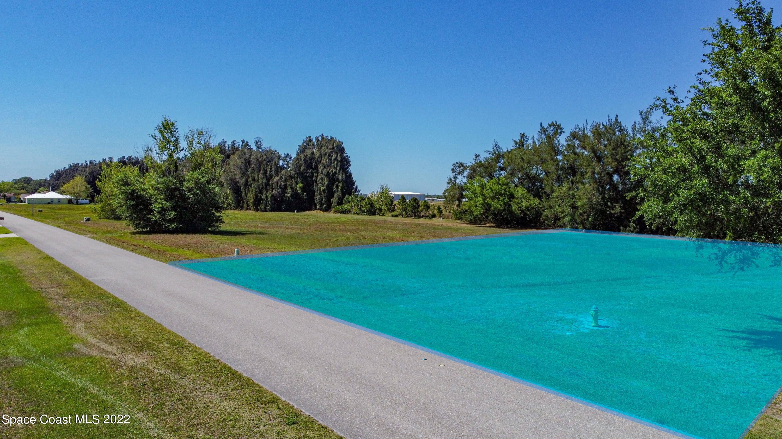 8301 Castile Road Sebring, FL 33876 - Photo 12 of 25 a view of a golf course with a garden