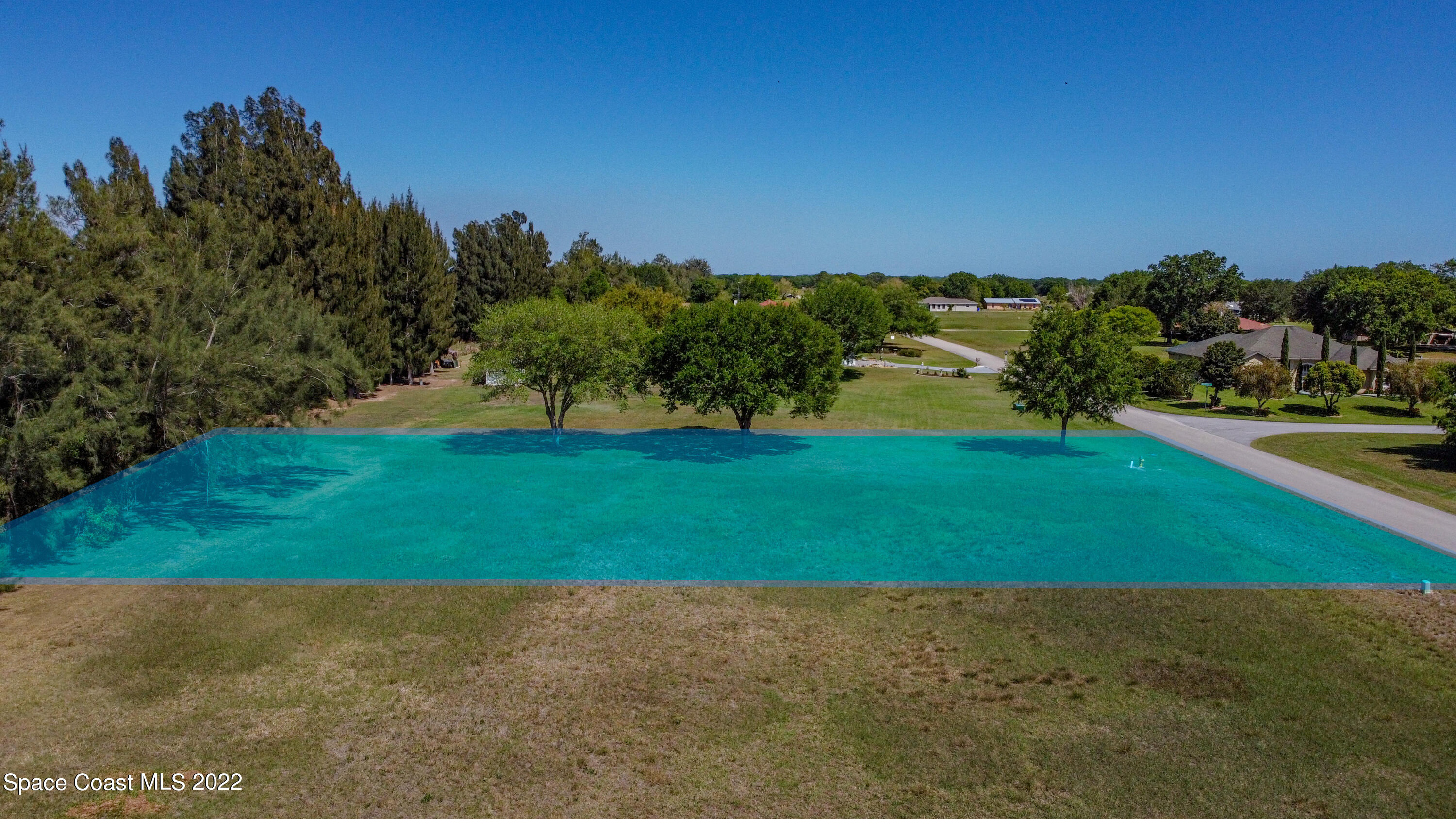 8301 Castile Road Sebring, FL 33876 - Photo 13 of 25 a view of a yard with a house