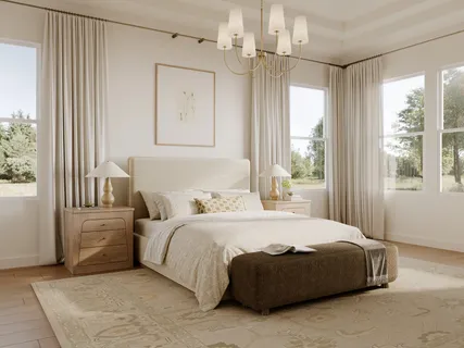 a bedroom with a large bed and a window