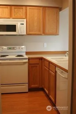a view of empty room with a fireplace