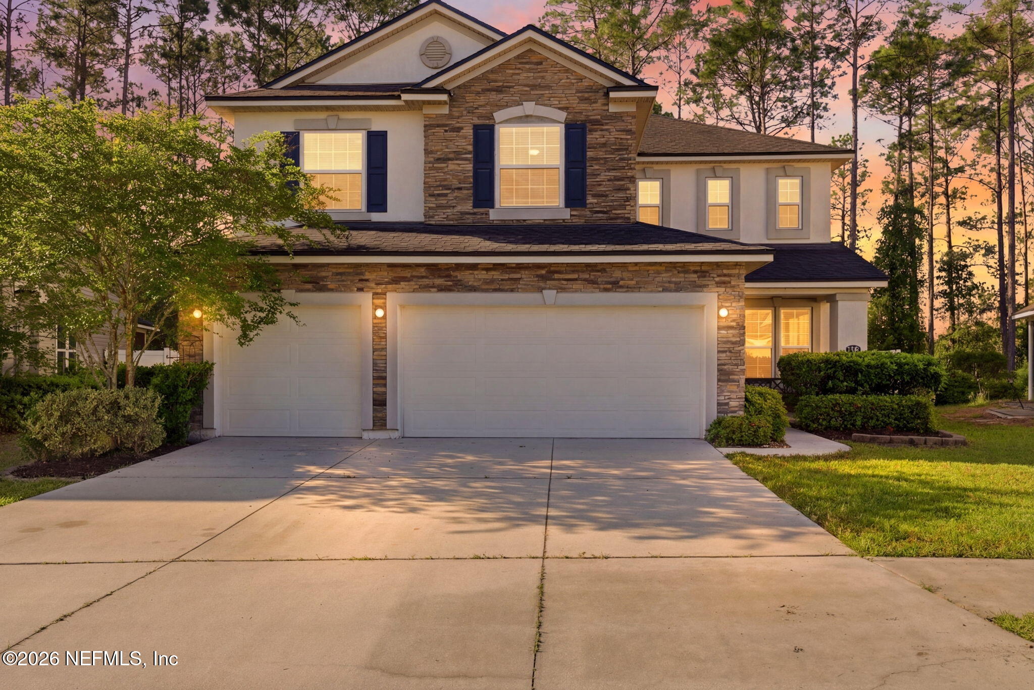 1090 Wetland Ridge Circle Middleburg, FL 32068 - Photo 2 of 87 Twilight Front Exterior