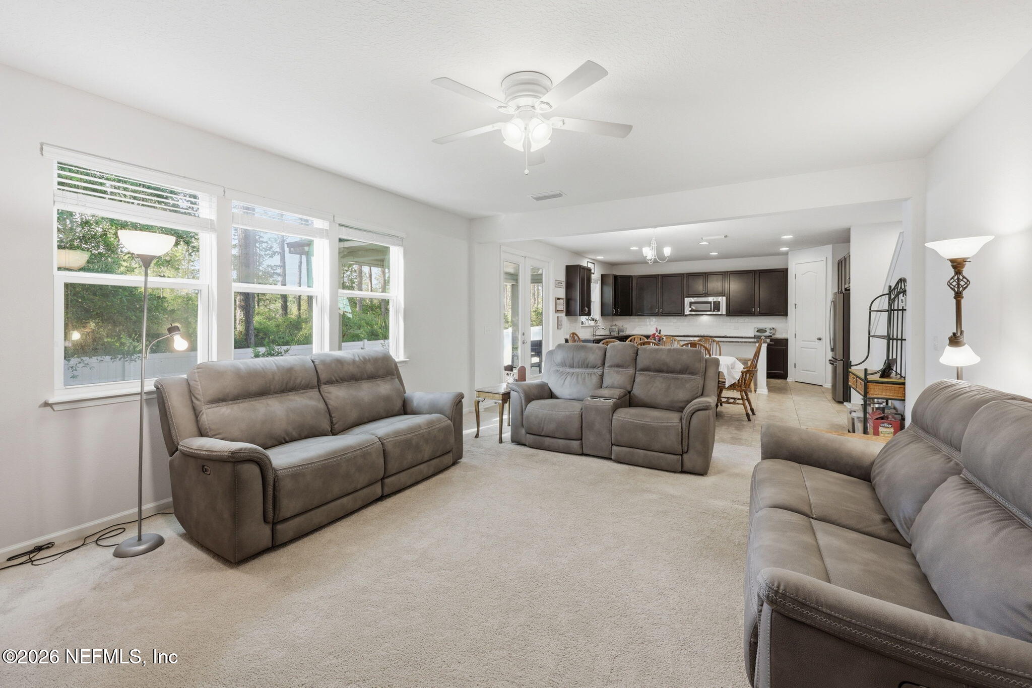 1090 Wetland Ridge Circle Middleburg, FL 32068 - Photo 23 of 87 Living Area to Kitchen