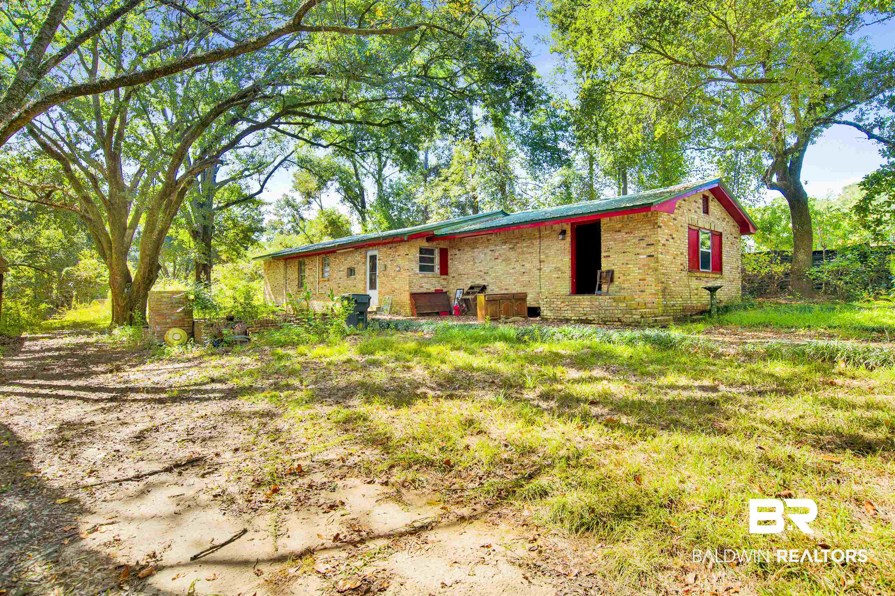 7623 Old Shell Road Mobile, AL 36608 - Photo 7 of 12 Back of property featuring brick siding and crawl space