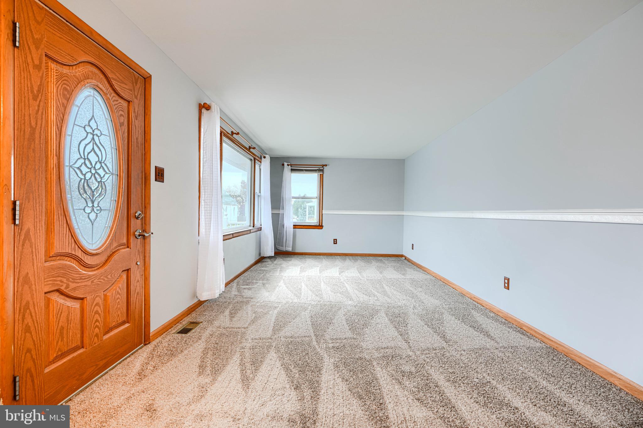 3118 Lynch Road Sparrows Point, MD 21219 - Photo 19 of 46 a view of an empty room with a window