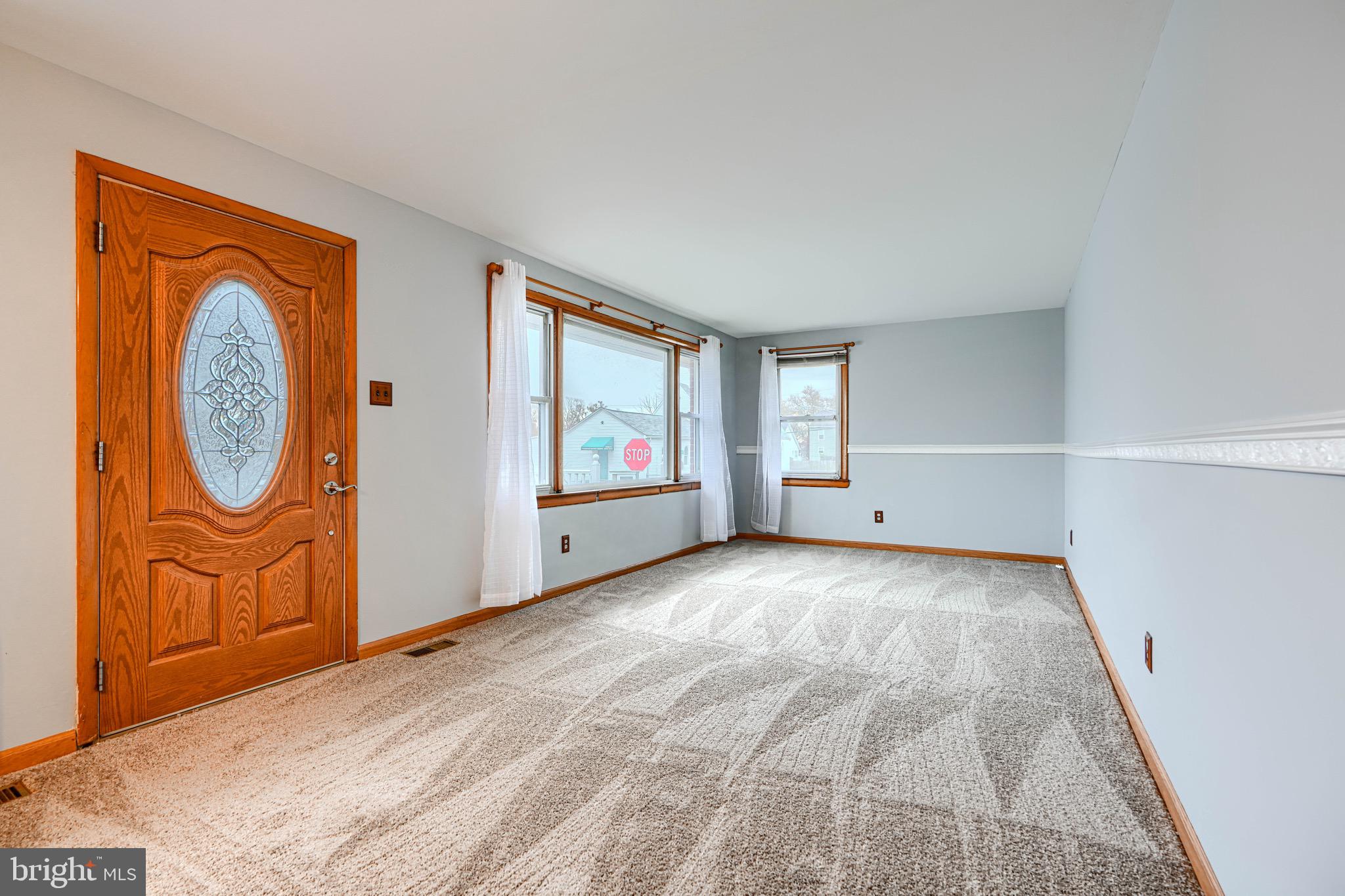 3118 Lynch Road Sparrows Point, MD 21219 - Photo 20 of 46 a view of empty room with window and fireplace