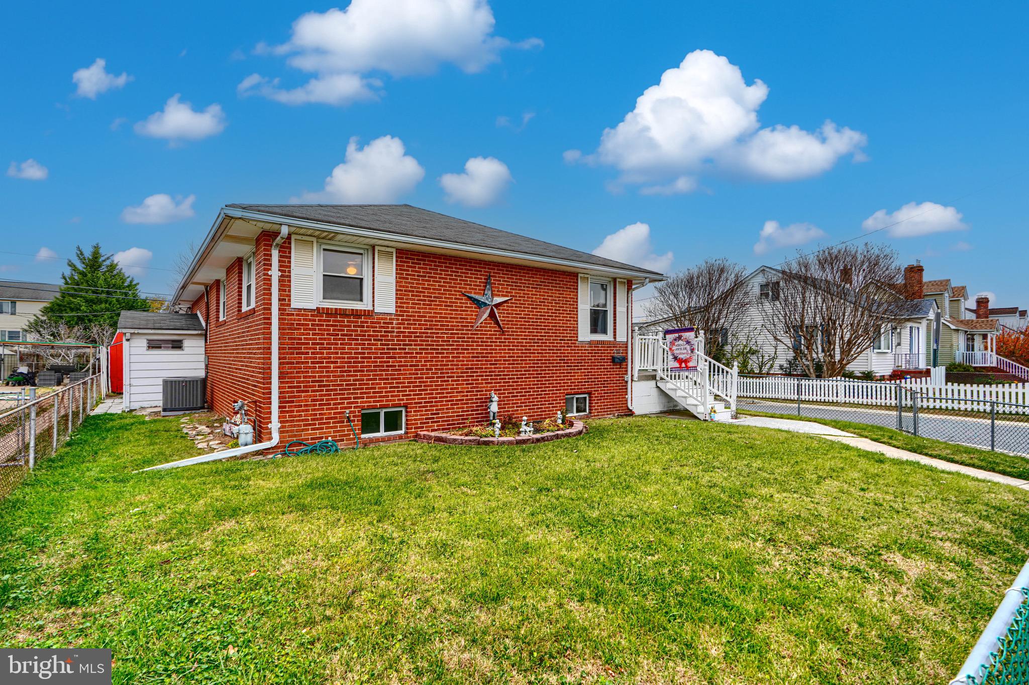3118 Lynch Road Sparrows Point, MD 21219 - Photo 2 of 46 a front view of house with yard
