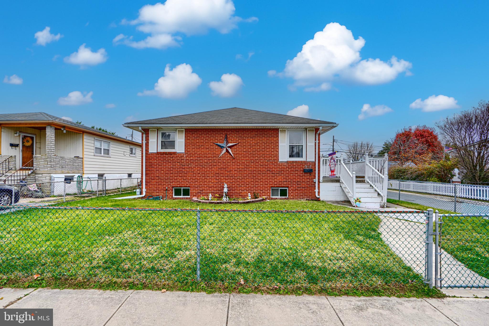 3118 Lynch Road Sparrows Point, MD 21219 - Photo 3 of 46 a backyard of a house with table and chairs