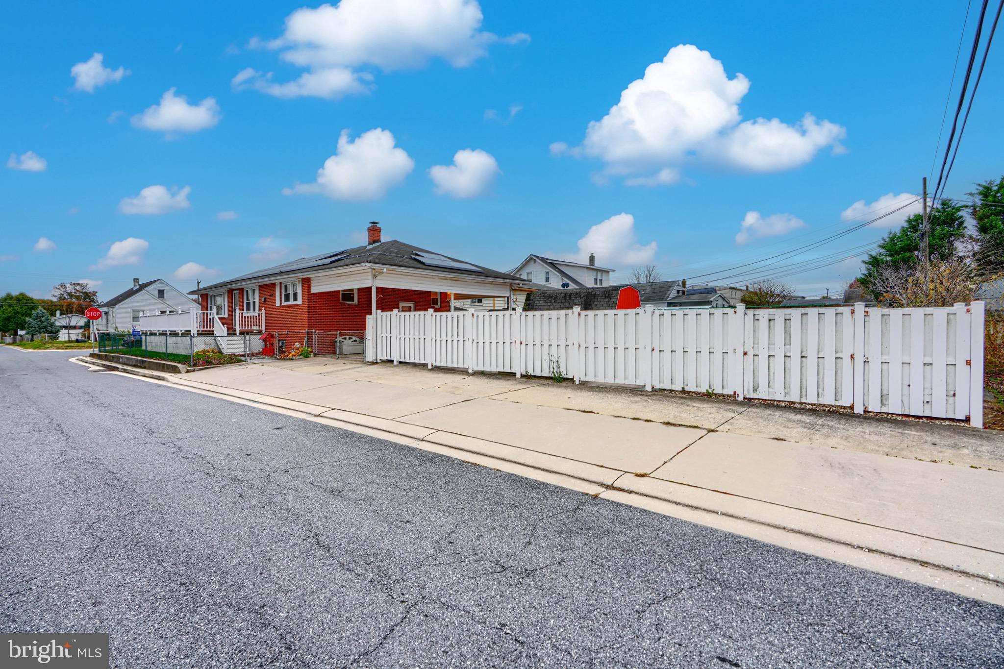 3118 Lynch Road Sparrows Point, MD 21219 - Photo 6 of 46 a view of a house with a backyard
