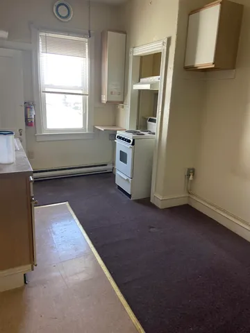 a view of a storage & utility room in a kitchen