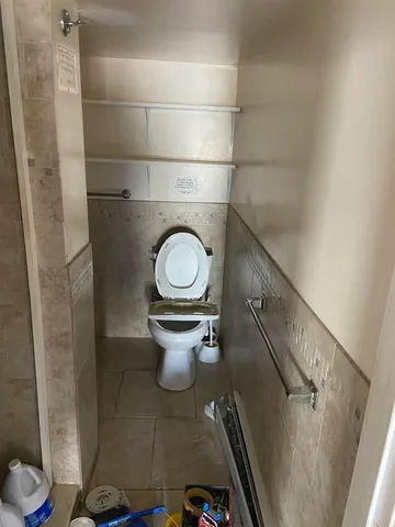 a bathroom with a toilet