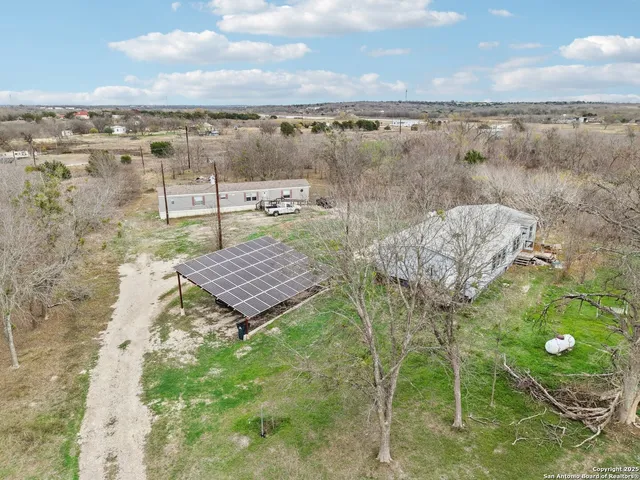 a view of a yard with an outdoor space