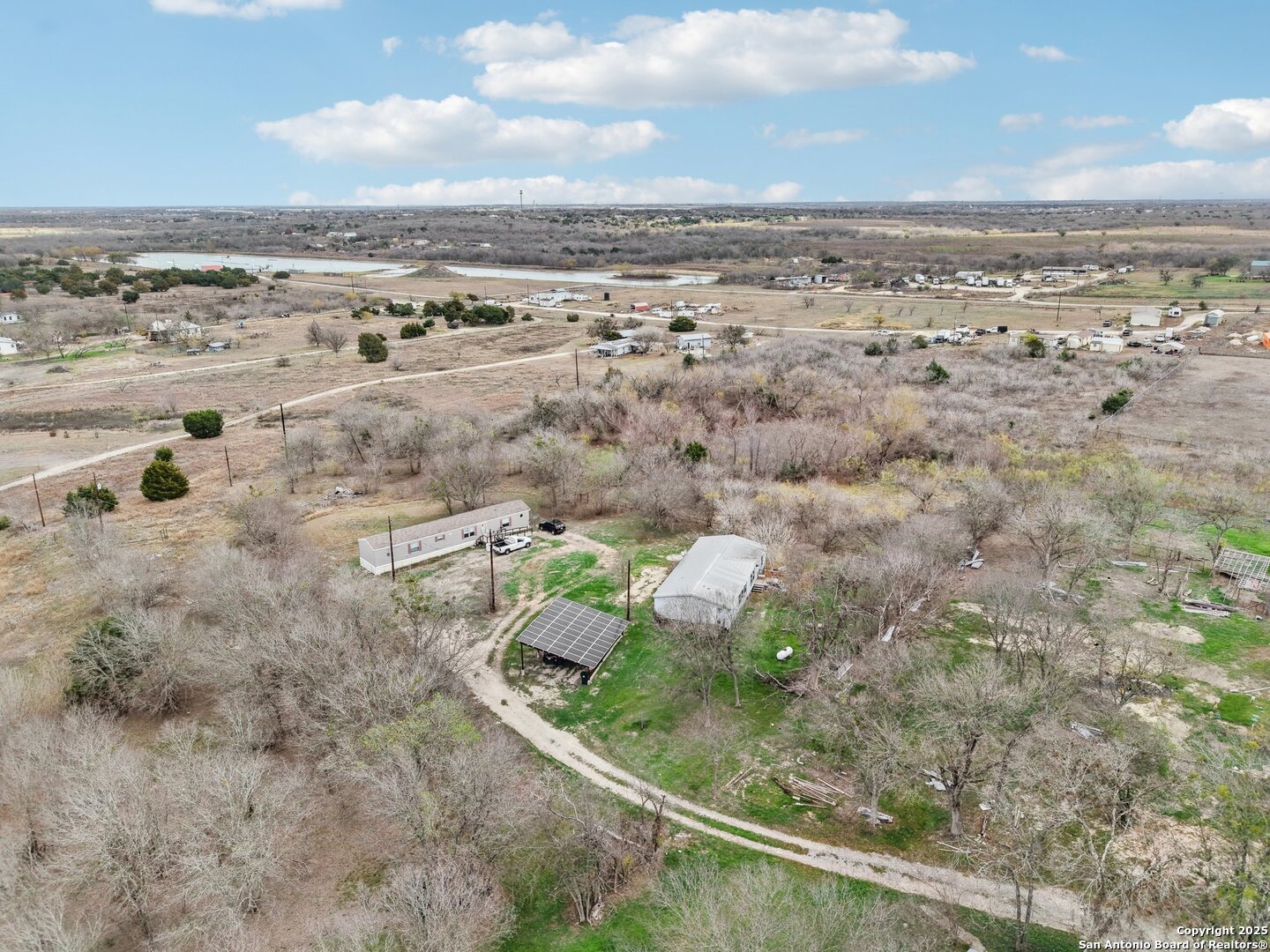 10701 Fm 1625 Austin, TX 78747 - Photo 23 of 43 an aerial view of residential houses with outdoor space