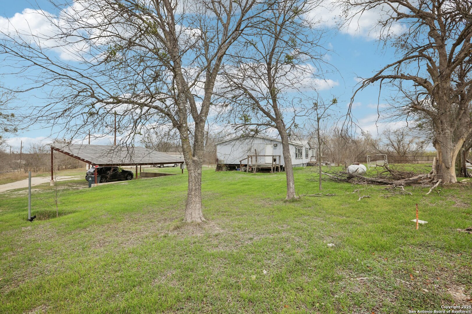 10701 Fm 1625 Austin, TX 78747 - Photo 4 of 43 a view of a house with a yard